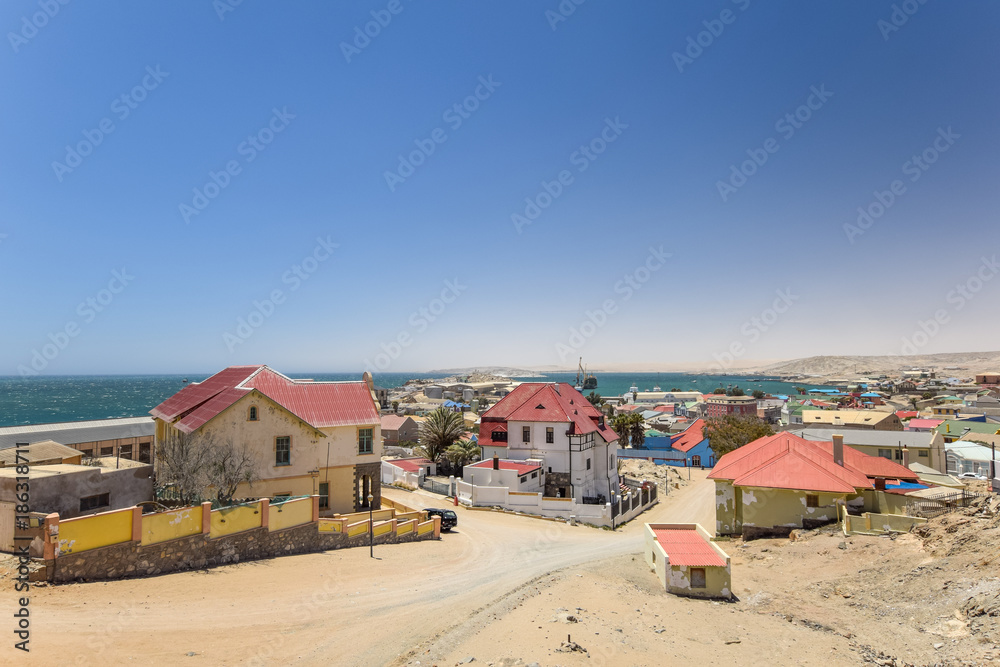 Beautiful view of the harbour town Lüderitz / Luderitz in southern Namibia, Africa. The town is known for its colonial architecture and prospered during the diamond rush in the 20th century.