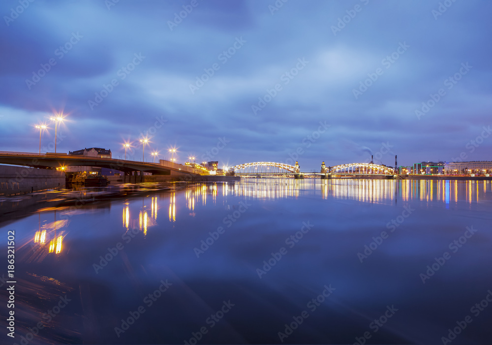 Evening Neva overlooking the Maloohtinsky and Bolsheokhtinsky bridges. St. Petersburg. Russia