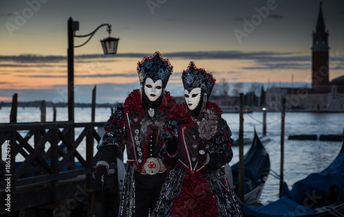 Venice, Italy - February 25, 2017: Famouse Venice Carnival. Masked people.