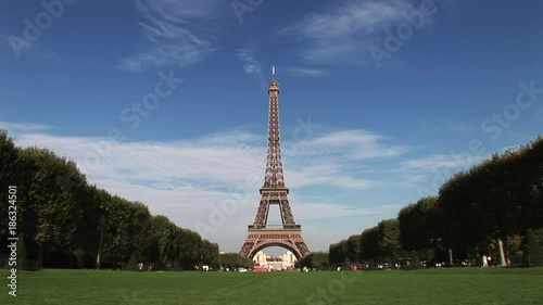 Low angle, Eiffel Tower over lush field