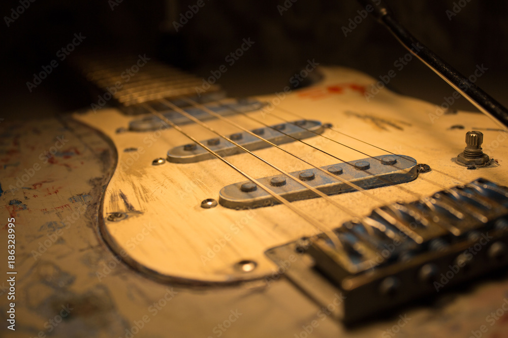 Old electric guitar close up shot Old electric guitar close up shot