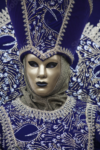Traditional Venice Carnival mask and costume worn at Febuarys festival in Venice Italy