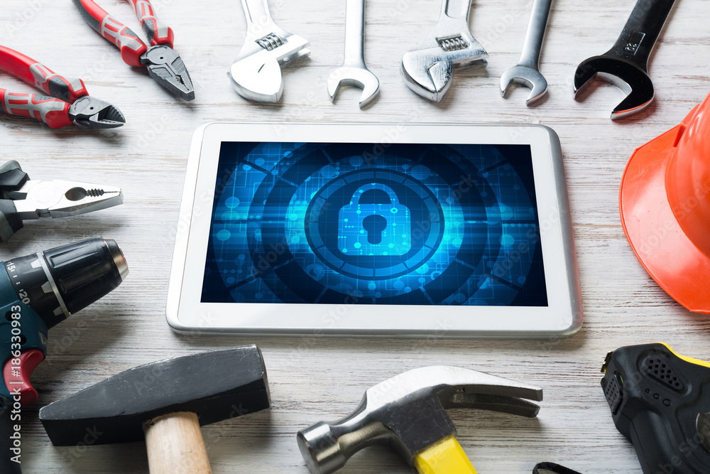 Web security and technology concept with tablet pc on wooden table Web security and technology concept with tablet pc on wooden table