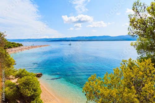 View of Zlatni Rat beach (Golden Horn) with beautiful sea water, most famous beach of Adriatic Sea, Brac island, Croatia