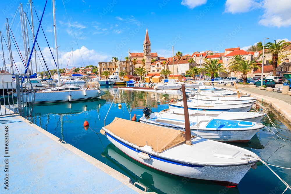View of Milna port with colorful fishing boats, Brac island, Croatia