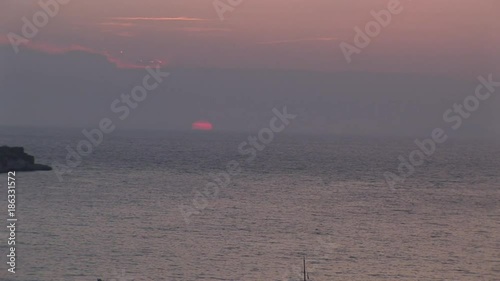 Wide, sunset over Italy coastline
