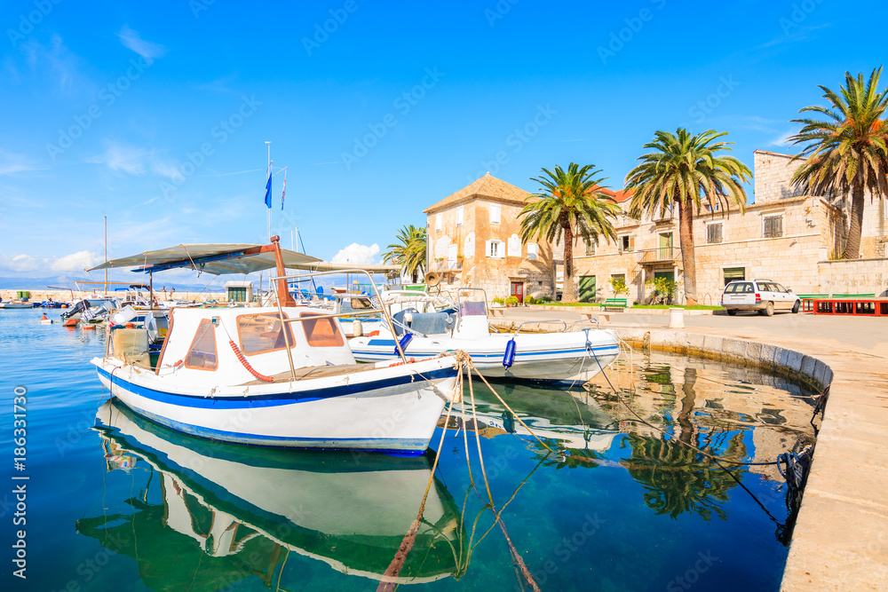 Fishing boat anchoring in beautiful Sutivan port, Brac island, Croatia