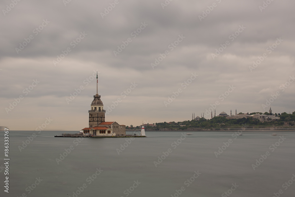 Maiden Tower (Tower of Leandros, Turkish: Kiz Kulesi) tranquil scenery at the entrance to Bosporus Strait in Istanbul, Turkey (KIZ KULESI – SALACAK-USKUDAR