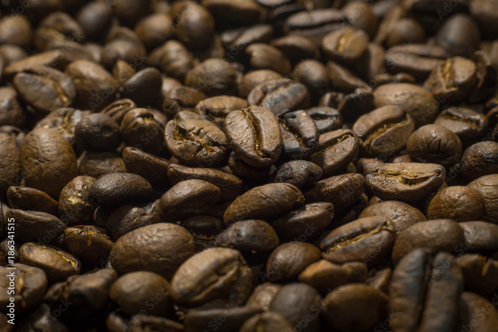 Roasted Coffee Beans macro close up image for background. Roasted Coffee Beans macro close up image for background.