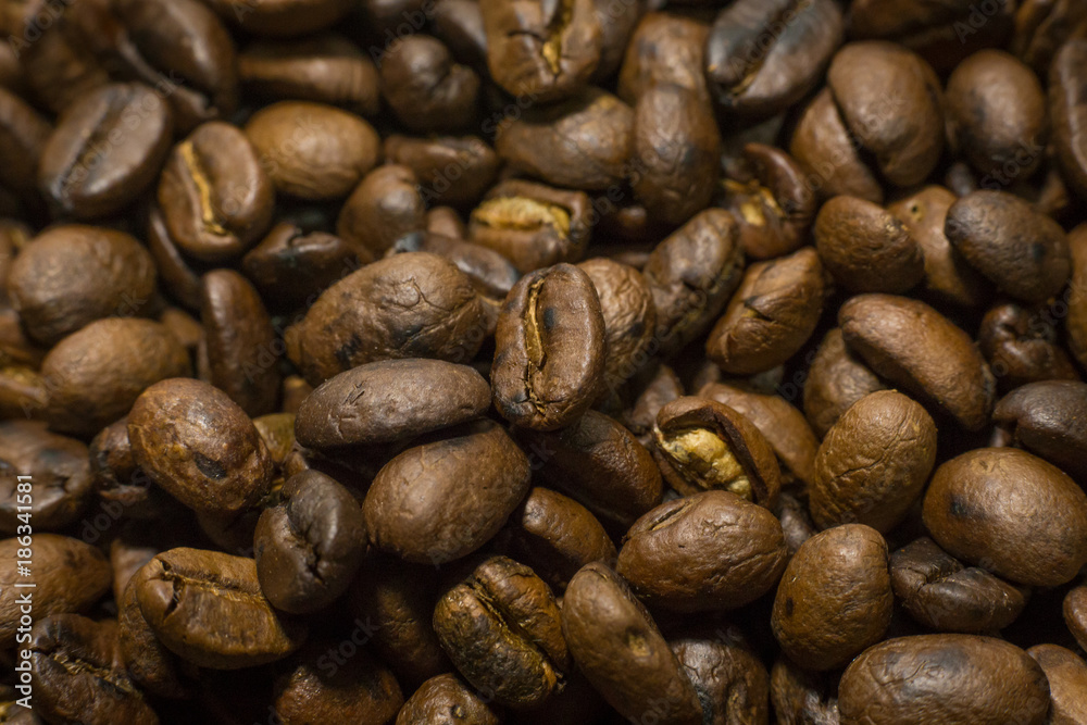 Roasted Coffee Beans macro close up image for background. Roasted Coffee Beans macro close up image for background.