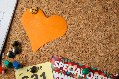 Blank Heart shaped Note on cork notice board