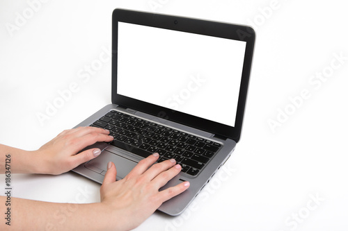 hand with modern notebook computer isolated on white background