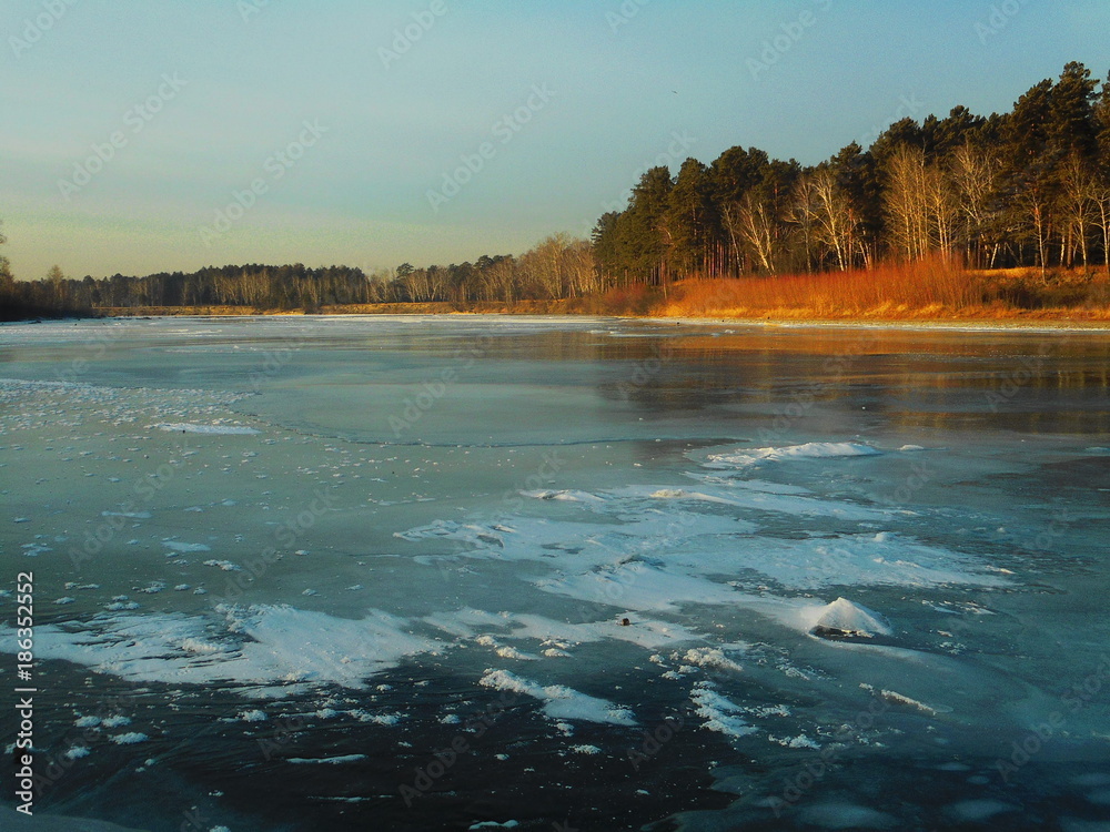 Siberian forest. autumn. trevel. the ice on the river