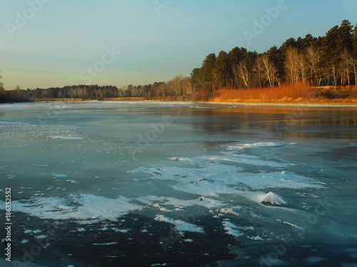 Siberian forest. autumn. trevel. the ice on the river