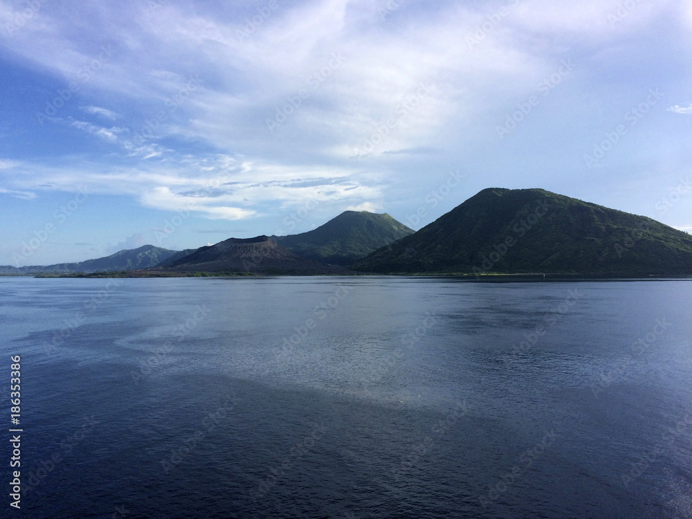 Scene of Simpson Harbour and Rabaul from a cruise ship.