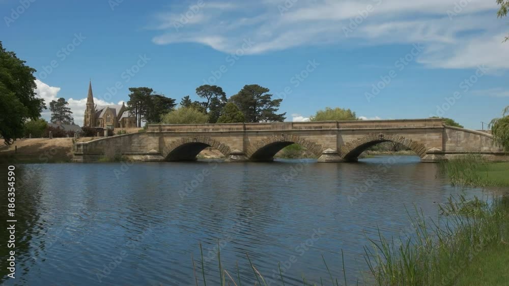 wide view of the historic sandstone bridge at ross, constructed by convict labour, and the third oldest bridge still in use in australia wide view of the historic sandstone bridge at ross, constructed by convict labour, and the third oldest bridge still in use in australia