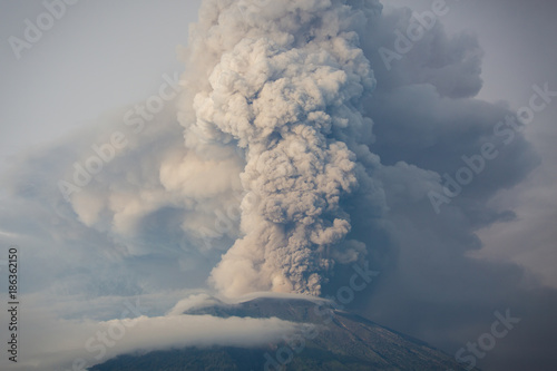 Mount Agung volcano erupting in Bali Indonesia.  photo