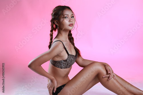 Portrait of sexy woman with pigtail and underwear