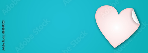 Valentine Day background. Pink paper heart on the blue background. photo