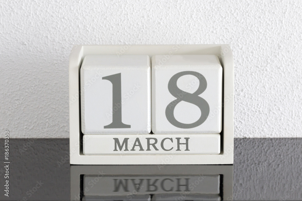 White block calendar present date 18 and month March