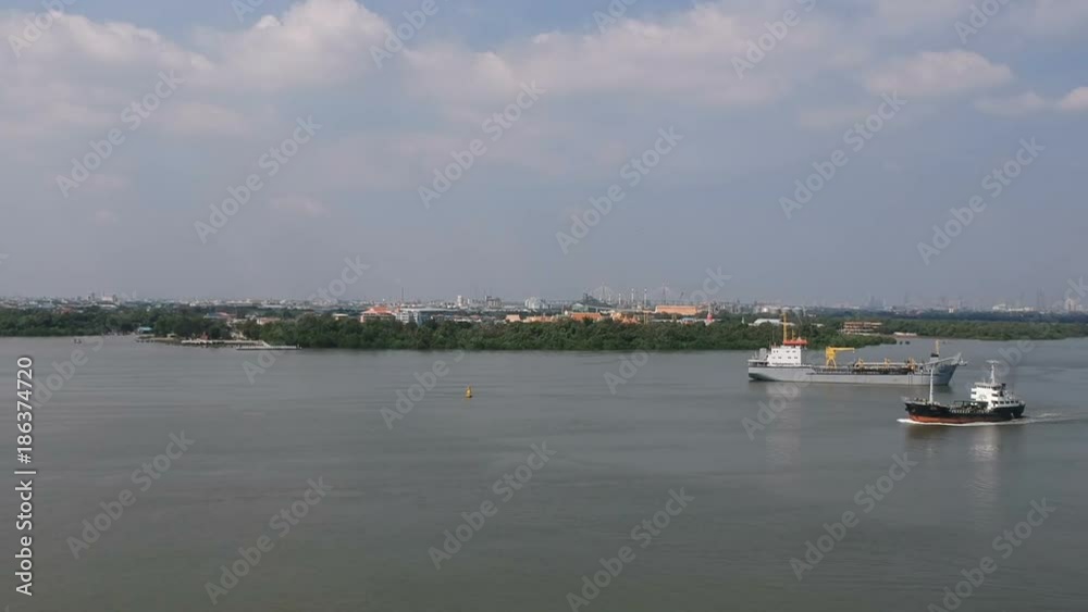 Aerial view panoramic of Gulf of Thailand, Cargo ship, Phra Samut Chedi and Rama IX Bridge Samutprakarn, Thailand. Aerial view panoramic of Gulf of Thailand, Cargo ship, Phra Samut Chedi and Rama IX Bridge Samutprakarn, Thailand.