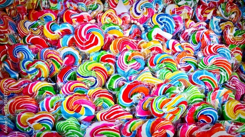 Pile of Colorful Vivid Lollipops in Confectionery Store