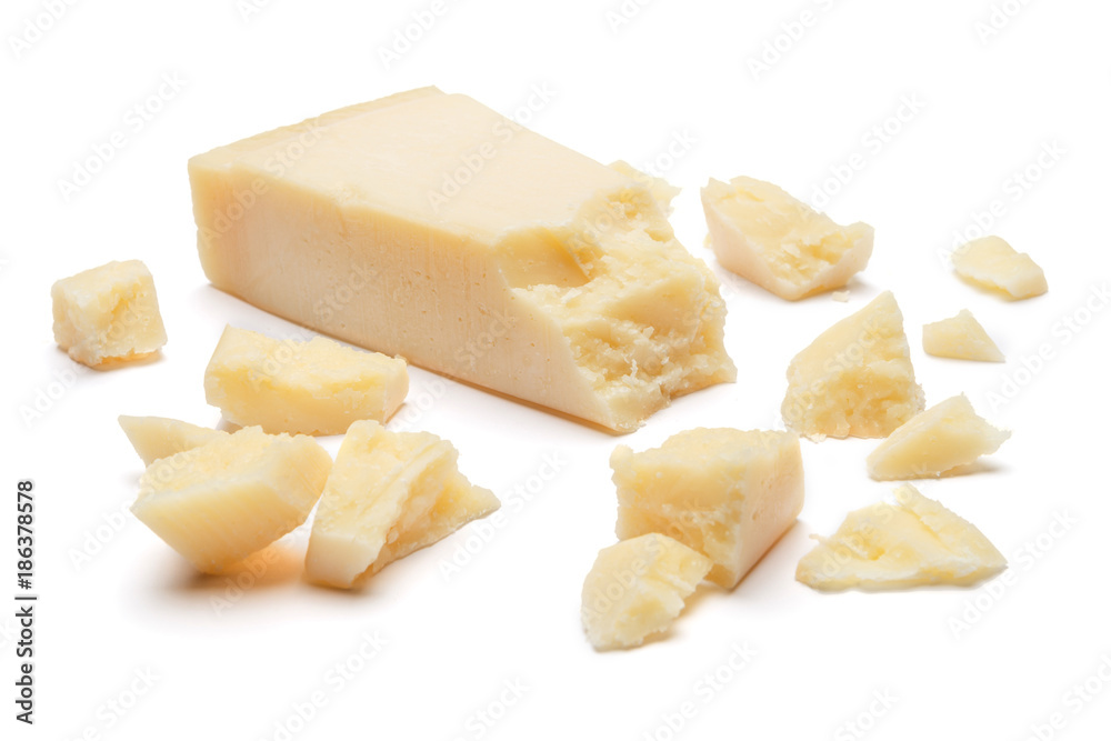 pieces of Parmesan cheese on white background