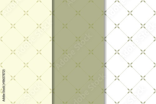 Olive green and white geometric ornaments. Set of seamless patterns