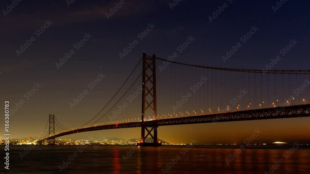 タイムラプス - 夜明けの明石海峡大橋 船の動き タイムラプス - 夜明けの明石海峡大橋 船の動き
