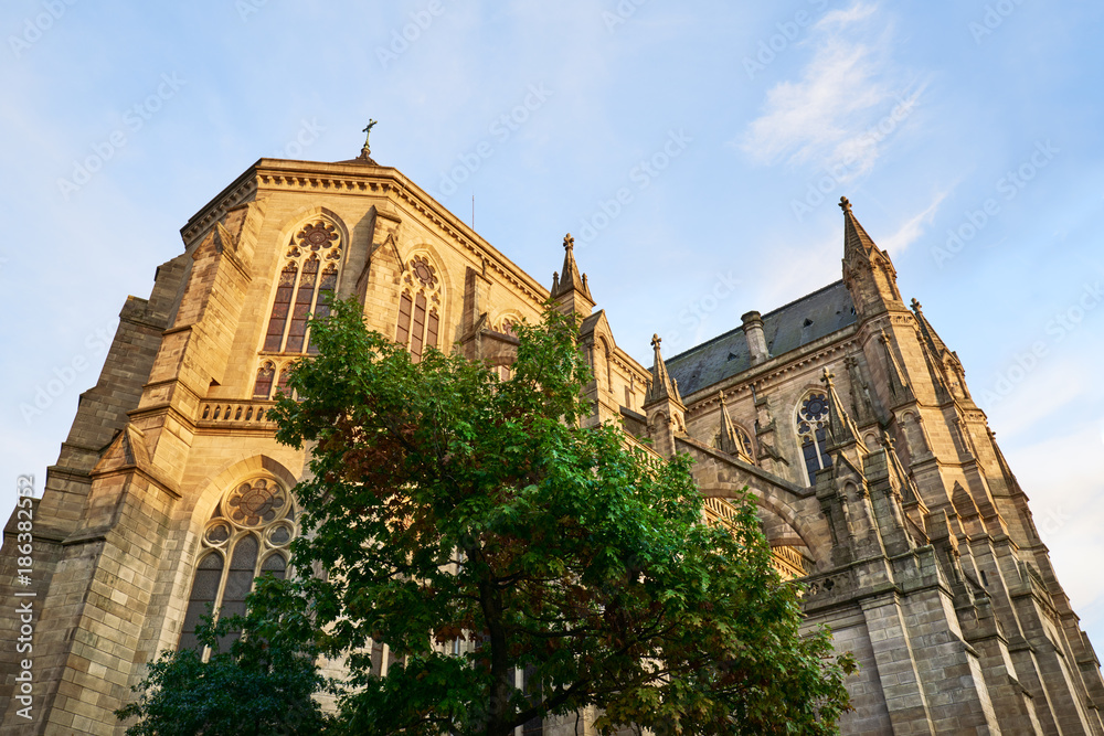 Obraz premium St Aubin Church in the city center of Rennes city, Brittany region of France. People on the street