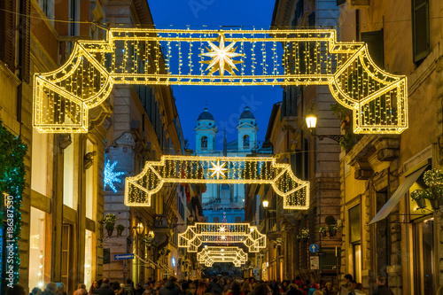 Via Condotti leading to Piazza di Spagna. Christmas time in Rome, Italy. photo