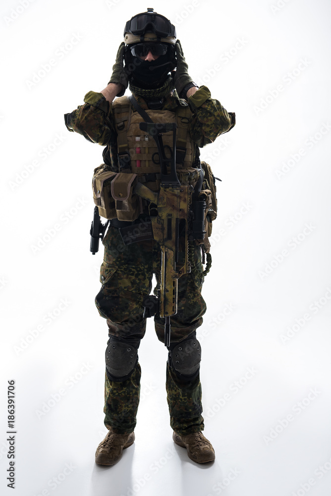 Full length portrait of puzzled defender keeping arms near ears. Protection concept Full length portrait of puzzled defender keeping arms near ears. Protection concept