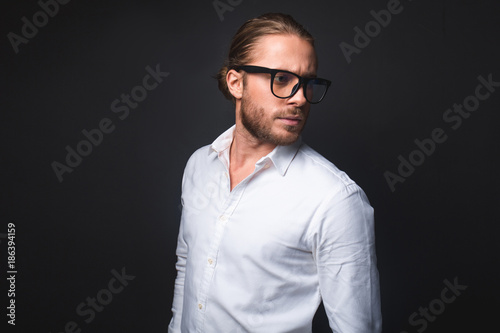 Fotografija Waist up of stylish guy n glasses