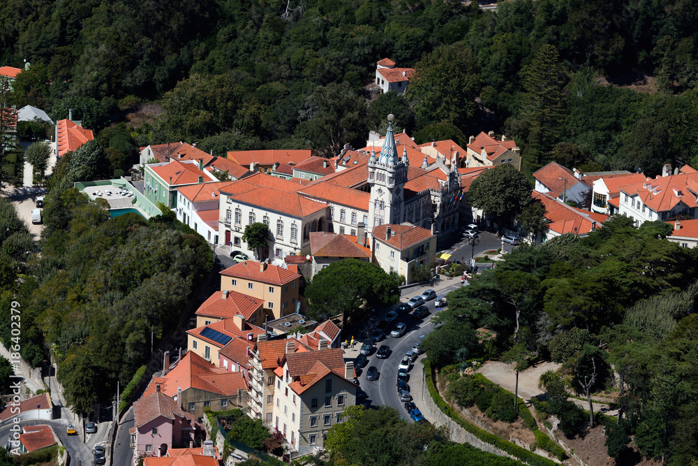 Town Hall of Sintra, Portugal, finished in 1910, follows the Manueline style of architecture and includes false battlements and beautiful arched Neo-Manueline styled windows.