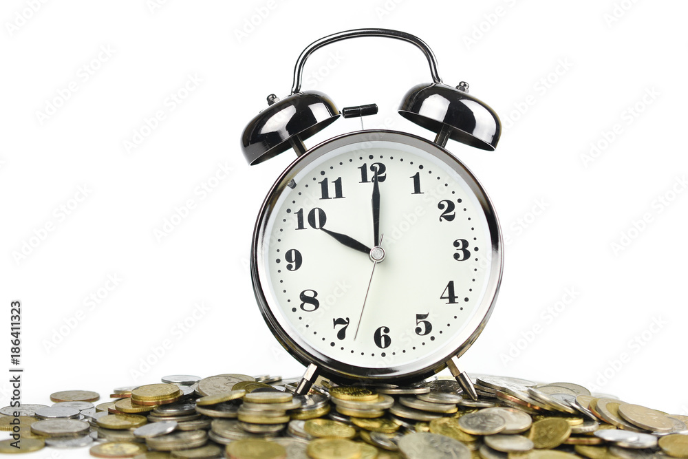 Alarm clock on the coins Alarm clock on the coins