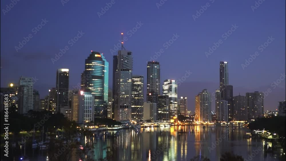 dawn close up of  the river and skyscrapers in the city of brisbane from kangaroo point