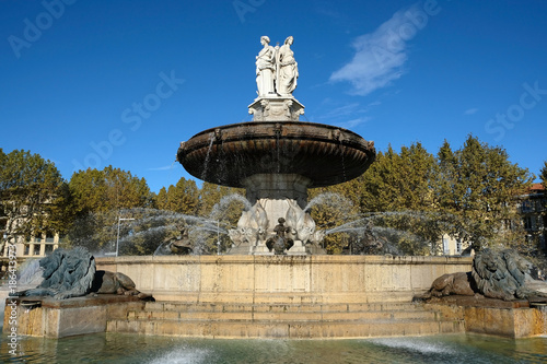 Famous historic rotonde fountain with lion statue tourist sight aix-en-provence aix en provence france photo