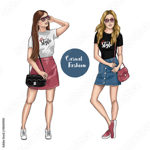 Two stylish beautiful young women with handbags. Women in fashionable summer clothes. Casual fashion. Hand drawn sketch. Vector illustration.