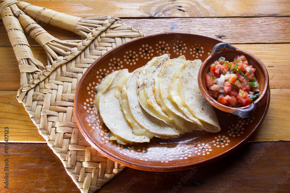 Traditional mexican quesadillas and pico de gallo sauce Stock Photo