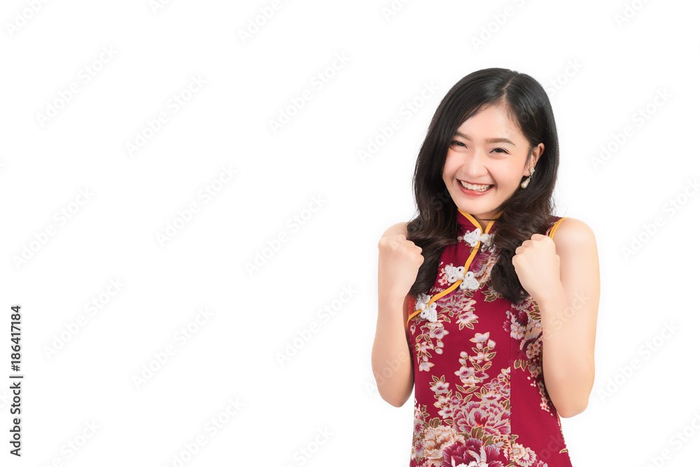 Asian woman wearing chinese dress feel excited or cheongsam,qipao smile in chinese new year on white isolated background Asian woman wearing chinese dress feel excited or cheongsam,qipao smile in chinese new year on white isolated background