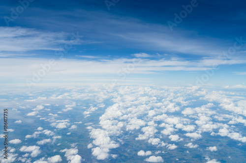 Aerial view of Blue sky and Cloud Top view from airplane window