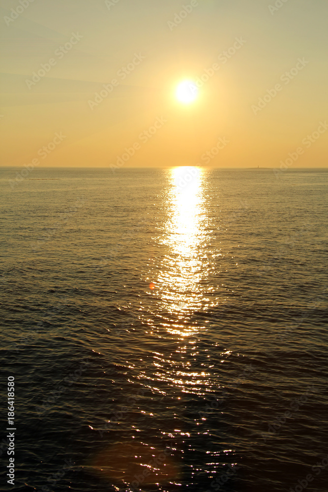 Obraz premium beautiful, fiery sunset at the sea