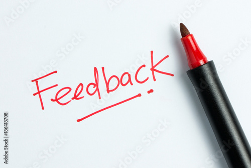 Feedback text with red marker pen photo