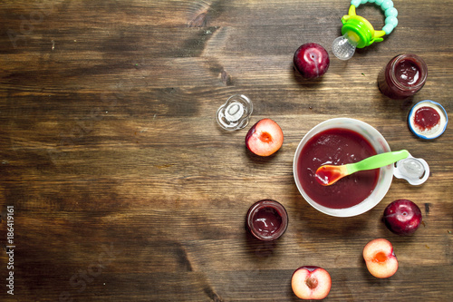 Baby food. Baby puree from fresh plums.