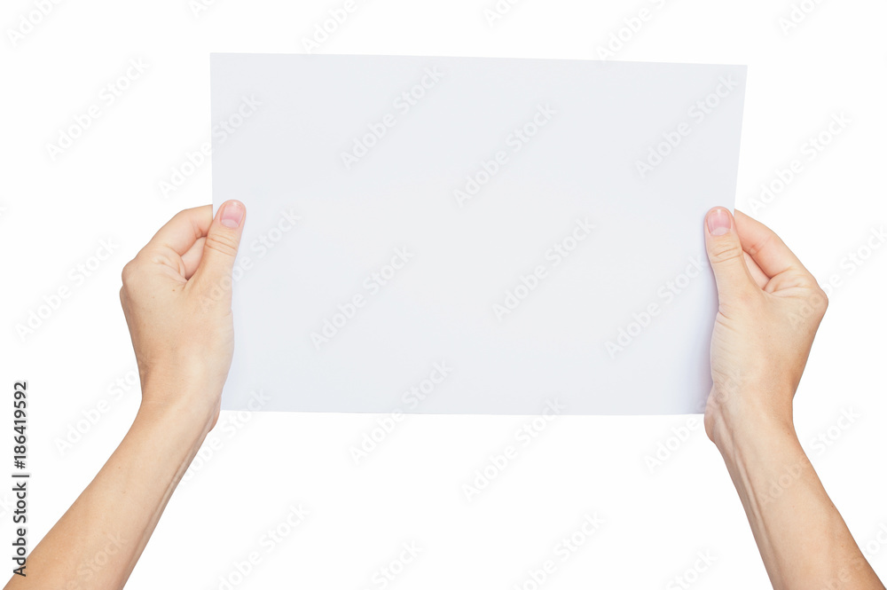 Female hands holding paper sheet. Isolated on white