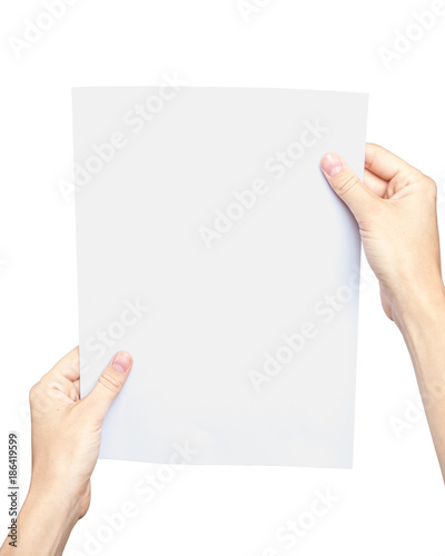 Female hands holding paper sheet. Isolated on white