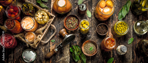 Various preserved vegetables and mushrooms with seamer and spices.
