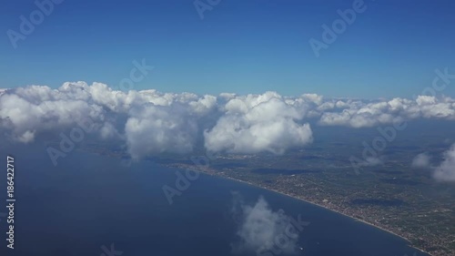 Flight over the Sea at the Level of Clouds