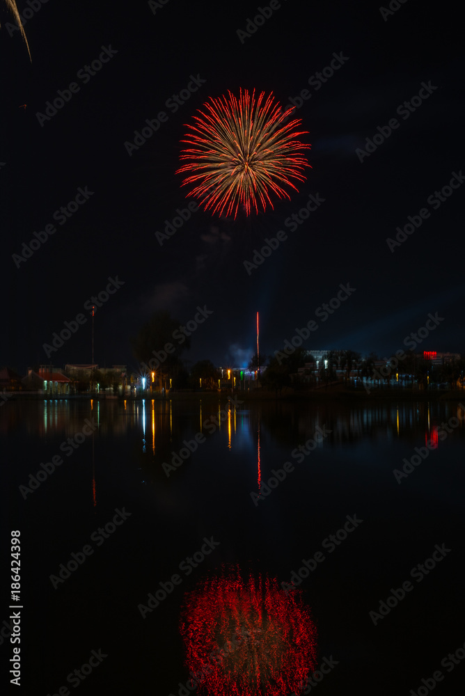 Happy New Year fireworks night scene, udon thani cityscape river view, city Happy New Year fireworks night scene, udon thani cityscape river view, city