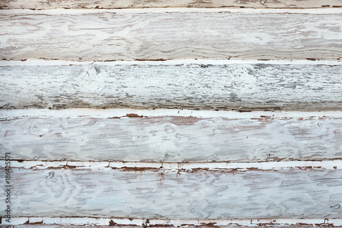 wall of the house built of bleached beams as background